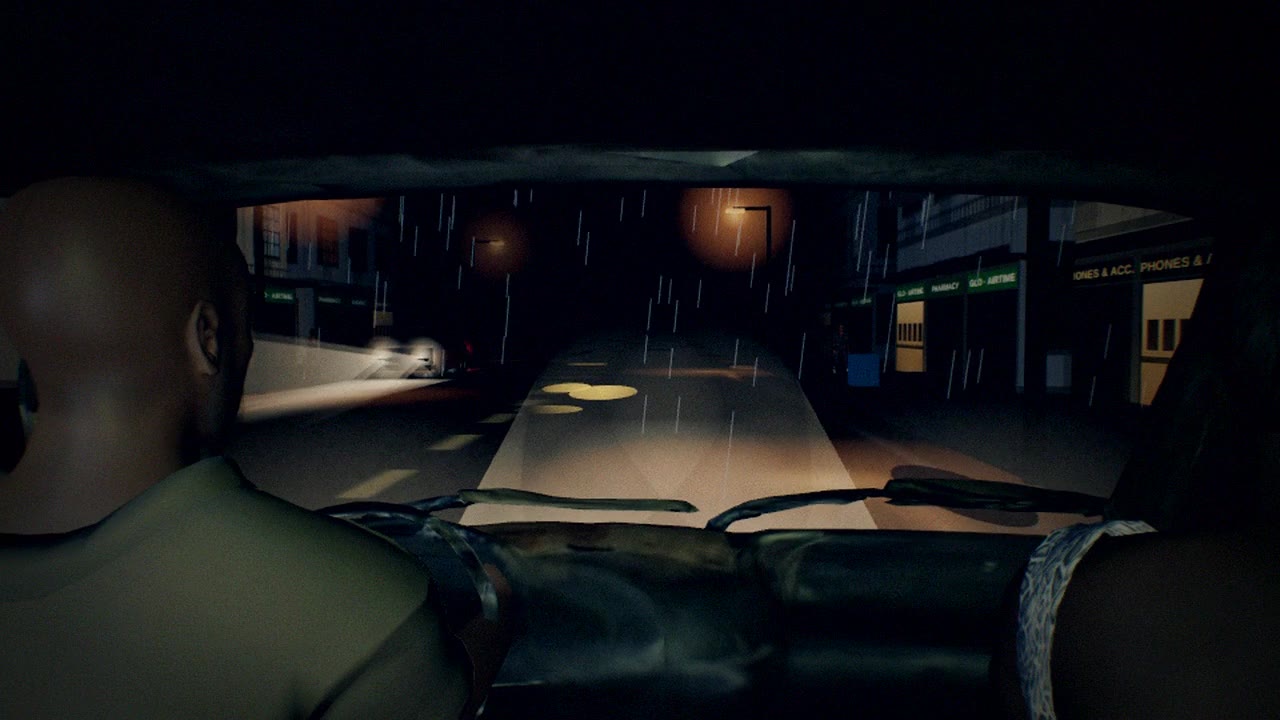 From behind the driver: wipers fight the rain on the windscreen of the danfo.